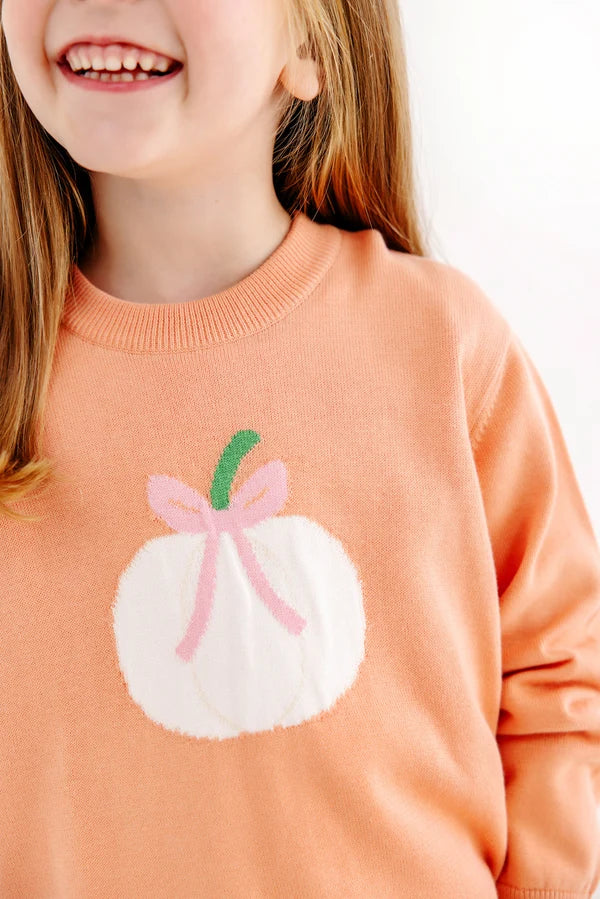 Isabelle's Intarsia Sweater, 
Seashore Sherbet/Pumpkin and Bow